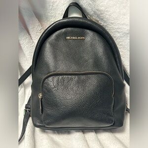 Copper pebbled leather MICHAEL KORS medium back pack. Gently used.